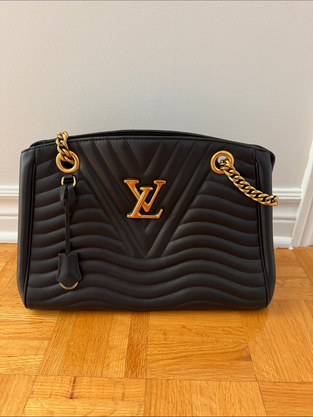 Louis Vuitton Black Quilted Shoulder Bag with Gold Hardware